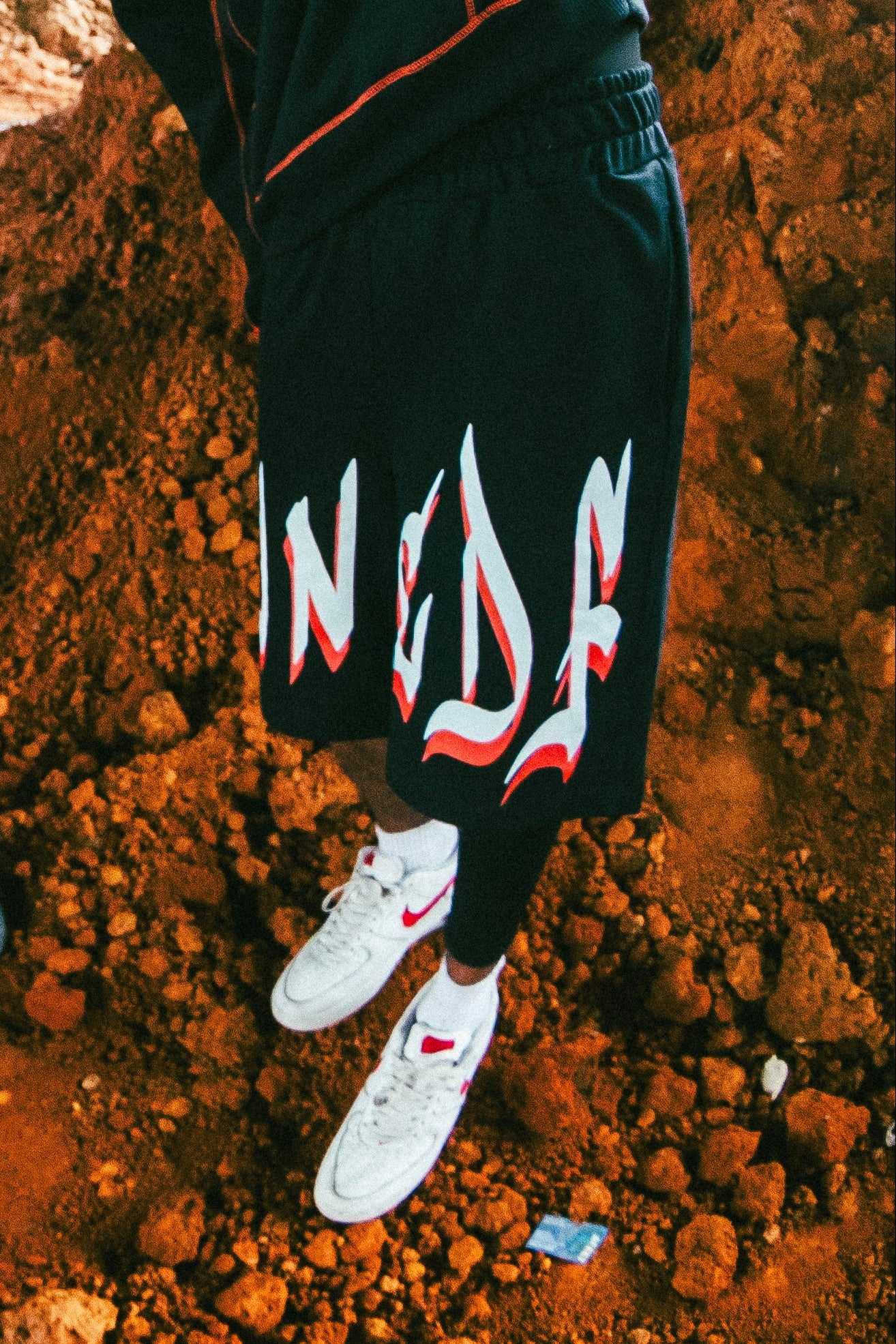 ORANGE BLACK GRAFFITI SHORTS